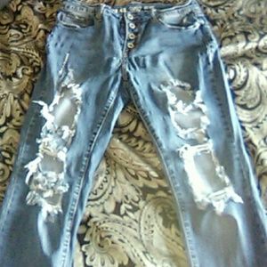 Distressed blue jeans